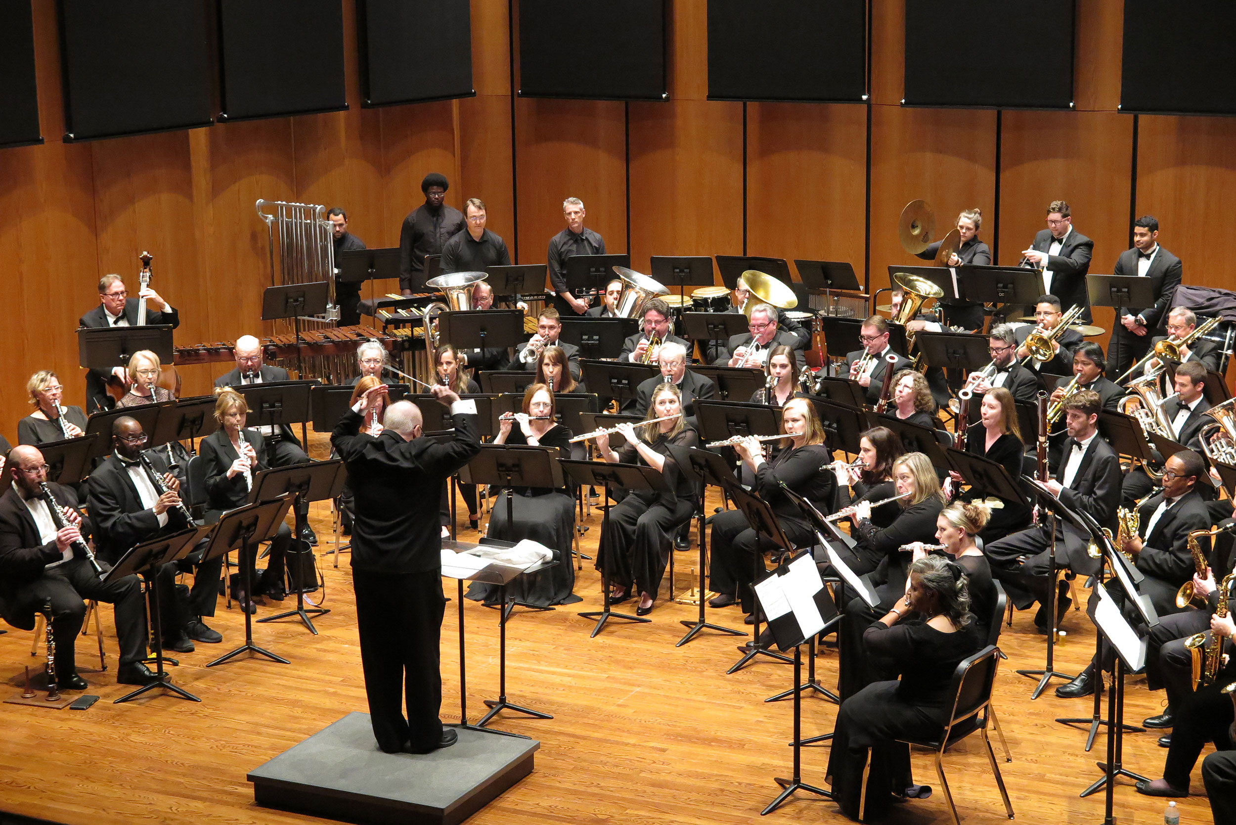Stamp conducts the First Coast Wind Symphony